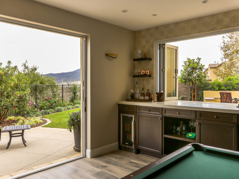 Flexible entertaining room opening to the garden in the Family Living custom home