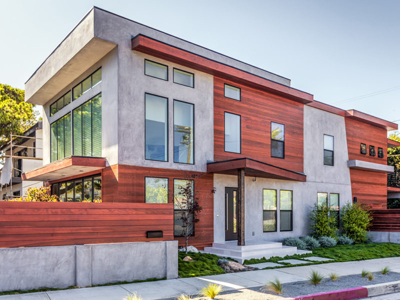 Redwood and concrete street elevation of the Contemporary Expression custom home by Fassino Construction